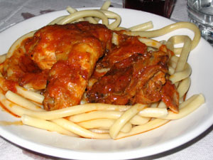 Corfu Pastitsada Pastitsada is a speciality of Corfu and consists of meat or chicken in a rich tomato sauce with macaroni.